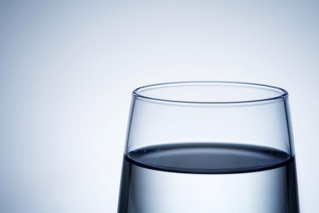 Closeup shot of pouring water into a glass