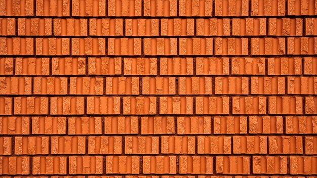 Foto closeup shot of red bricks at the corner of a building