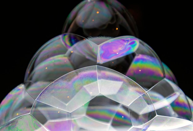 Closeup shot of soap bubbles piled up in a pyramid shape