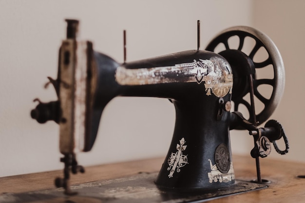 Photo closeup shot of a weathered vintage sewing machine