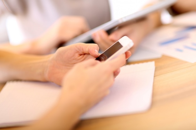 Closeup of smartphone used in office