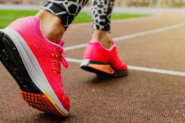 Closeup of the sneakers of a female athlete Training in an open area Healthy lifestyle