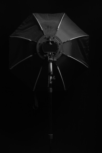 closeup, softbox with pole in photo studio room, photography equipment