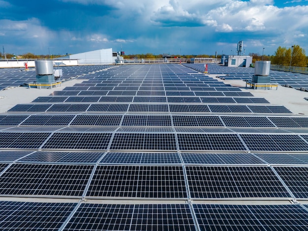 Closeup of solar cell farm power plant eco technology landscape of solar cell panels in a photovoltaic power plant concept of sustainable resources and renewable energyblue tone