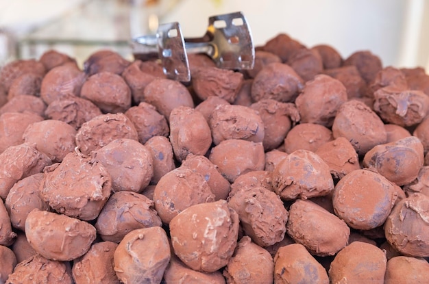 Closeup of some of the different types of exquisite chocolates for sale in shops specializing in the famous Belgian chocolate