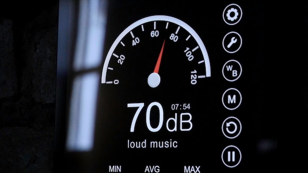 Closeup of sound level meter screen in decibels Modern electronic sound meter around