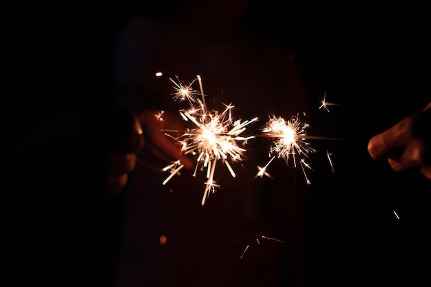 Closeup sparkler light with dark backgroundxA