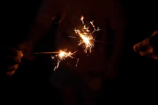 Closeup sparkler light with dark backgroundxA