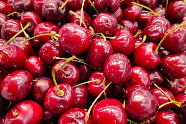 Closeup on a stack of cherries on a market stall