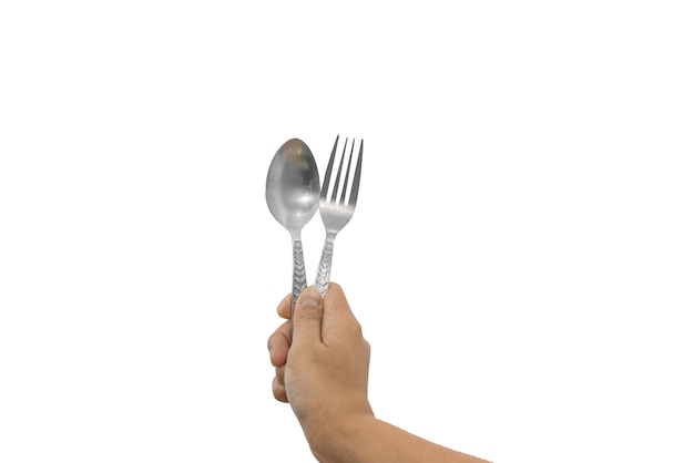 Closeup steel spoon and fork in hand isolated on white background