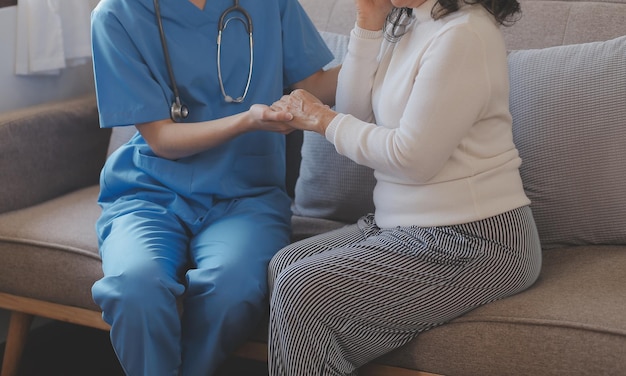 Closeup of stethoscope and paper on background of doctor and patient hands