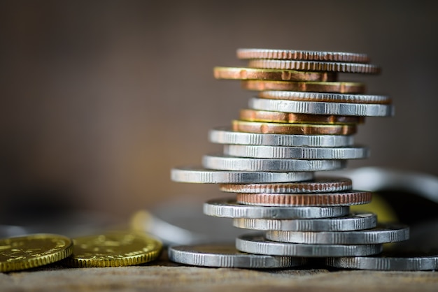 Closeup strack of money coins with different position