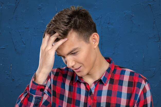 Closeup stressed young man