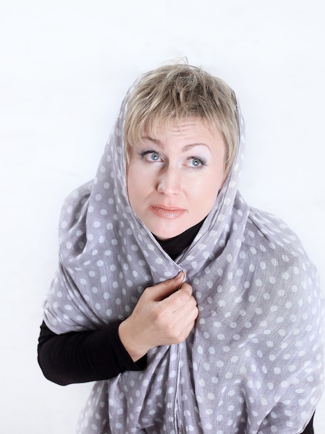 Closeup .stylish women dressed in a soft handkerchief. isolated on a white background.