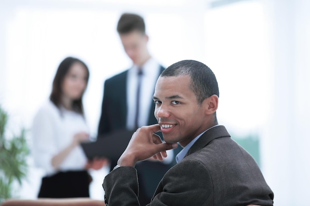 Closeup a successful businessman on blurred background