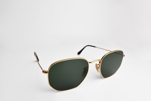 closeup sunglasses with gold frame