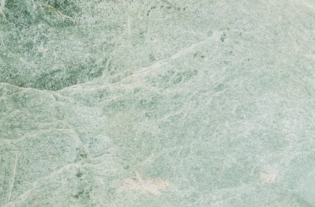 Closeup surface abstract marble pattern at the green marble stone floor textured background