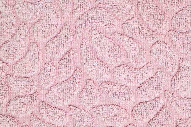 Closeup surface fabric pattern at old pink fabric mat texture background