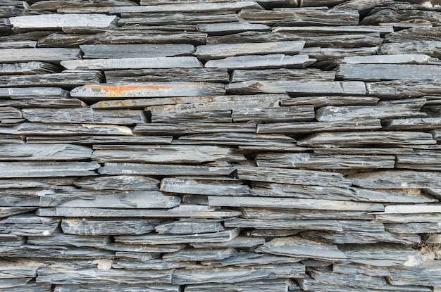 クローズアップ表面の灰色の石造りの壁テクスチャ背景