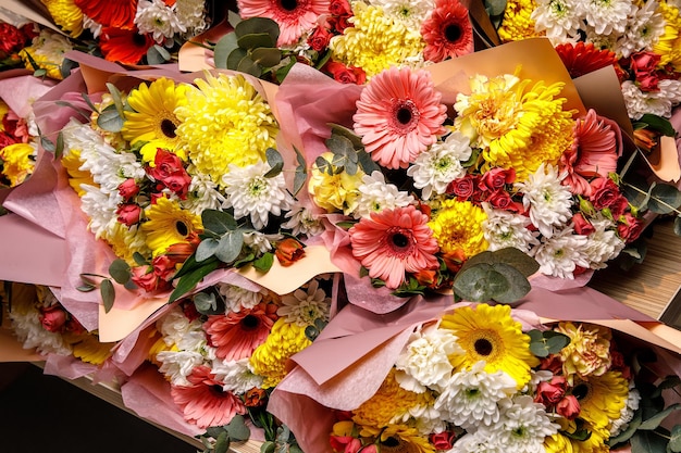 Closeup texture background of flowers Bouquet of flowers gerbera carnation roses