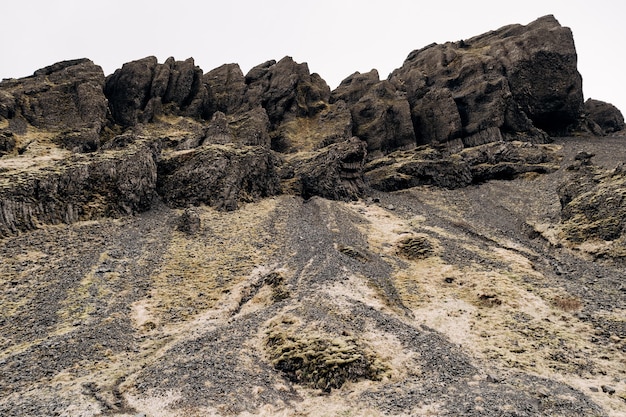 A closeup of the texture of the mountains in iceland basalt volcanic rocks puff stones covered with