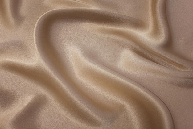 Struttura del primo piano di tessuto beige naturale o panno di colore marrone