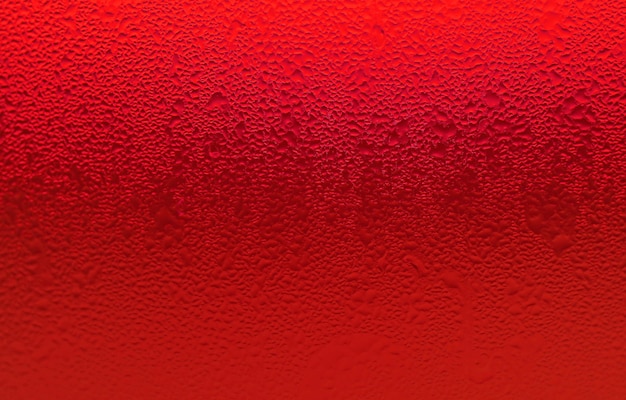 Closeup Texture of Water Droplets on Vibrant Red Chilled Cocktail Glass