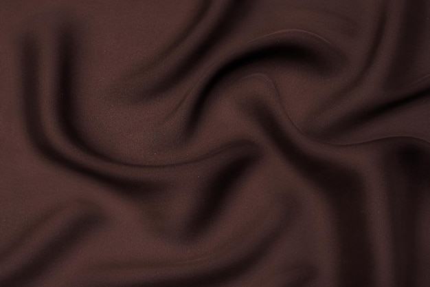 Closeup textuur van natuurlijke cacao stof of doek in dezelfde kleur stof textuur van natuurlijke katoen zijde of wol of linnen textiel rood canvas backgroundxdxd