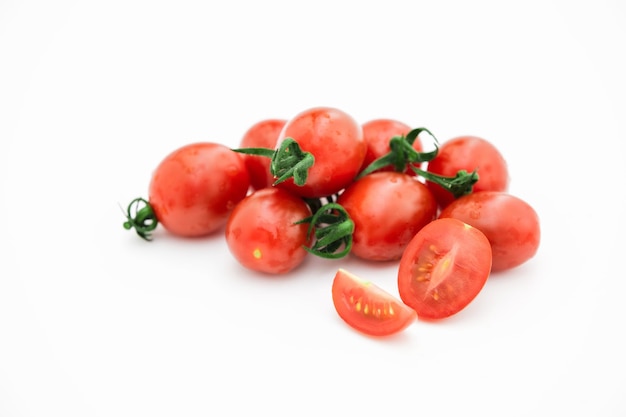 Closeup of tomato white on white background  Healthy vegan food Tomato top view