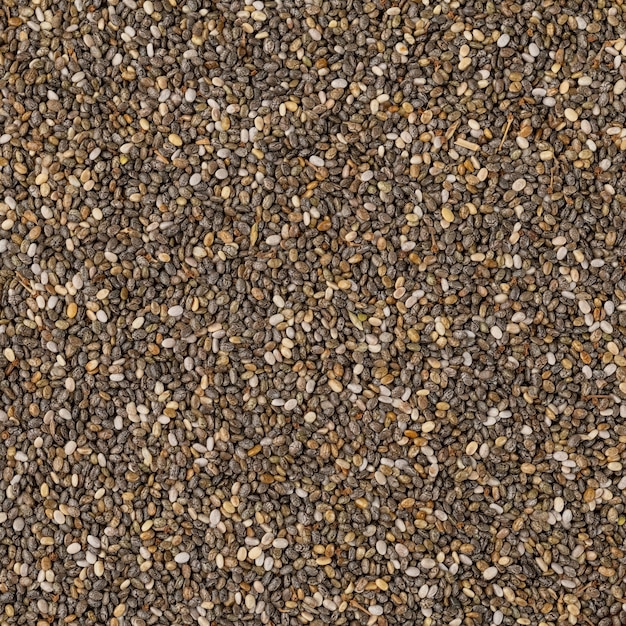 Closeup, top view of chia seeds. Food backdrop.