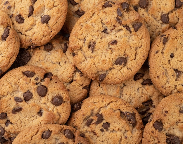 Closeup top view of chocolate chip cookies. Cookies backdrop.