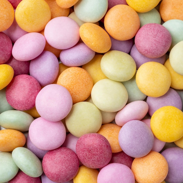 Closeup top view of colorful candies Candy backdrop