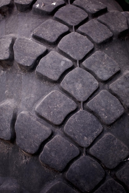 Photo closeup of tractor tire tread as background