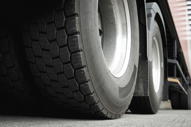 Photo closeup the truck tires, freight industry truck transport