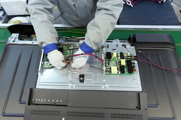 Closeup of the TV assembly line at the factory