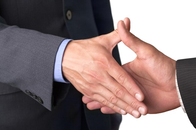 Photo closeup of two businessmen shaking hands