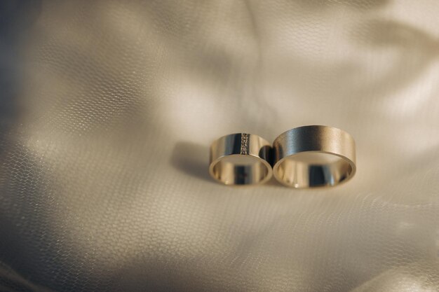 Closeup of two gold wedding rings for a wedding