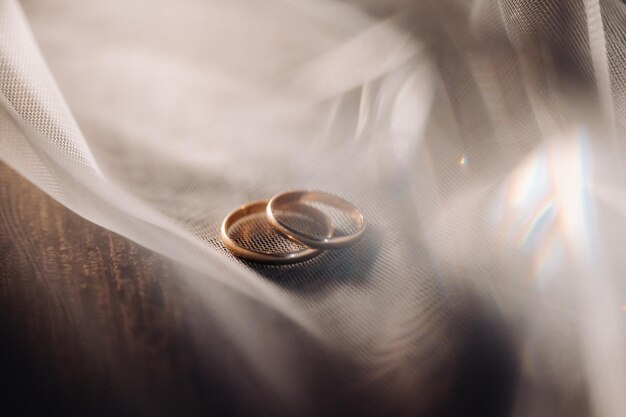 Closeup of two gold wedding rings for a wedding