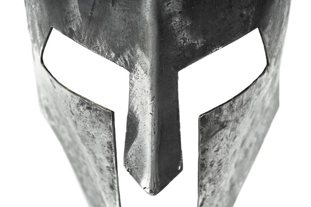 Closeup view of ancient iron spartan helmet isolated