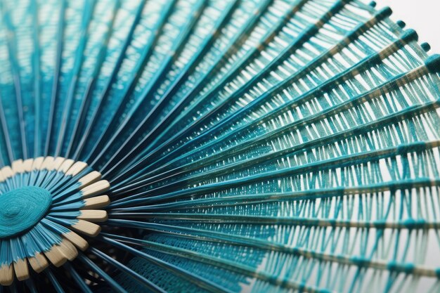 Photo closeup view of a blue fan with intricate designs generative ai