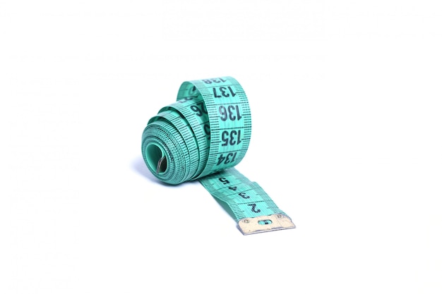 Closeup view of blue measuring tape isolated over white background