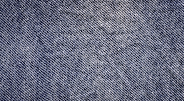 Вид крупным планом синяя натуральная чистая джинсовая текстура Текстура джинсовой ткани крупным планом Джинсовый джинсовый фон