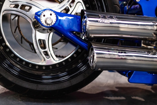 Closeup view of brake disk, wheel and tyre of a motorcycle