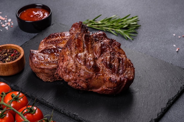 Closeup view of delicious grilled beef medallions served on table