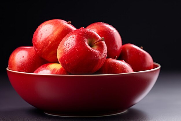 A closeup view of a healthy bowl filled with red sweet apples A tempting and nutritious treat