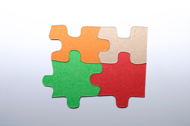 Closeup view of a jigsaw puzzle with colorful pieces