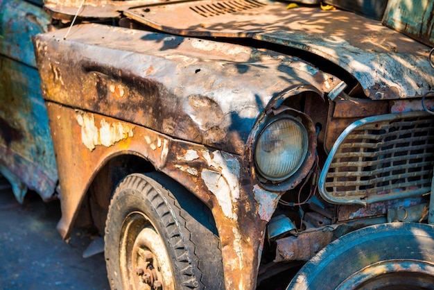 Closeup view of old rusty car