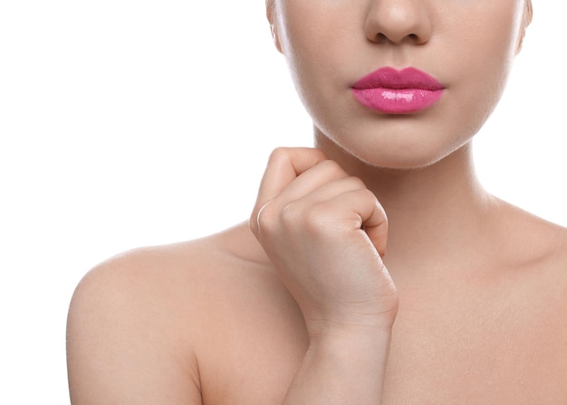 Photo closeup view of woman with beautiful full lips on white background