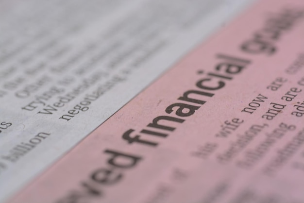 A closeup view of the wording Financial prominently displayed on a newspaper