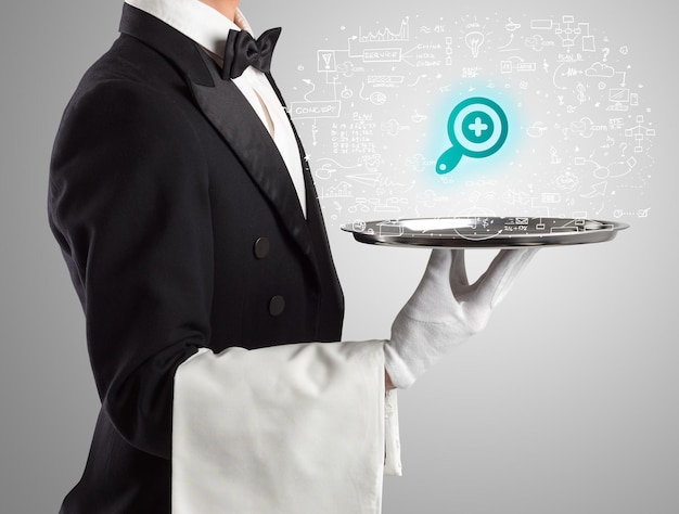 Photo closeup of waiter serving social media icons